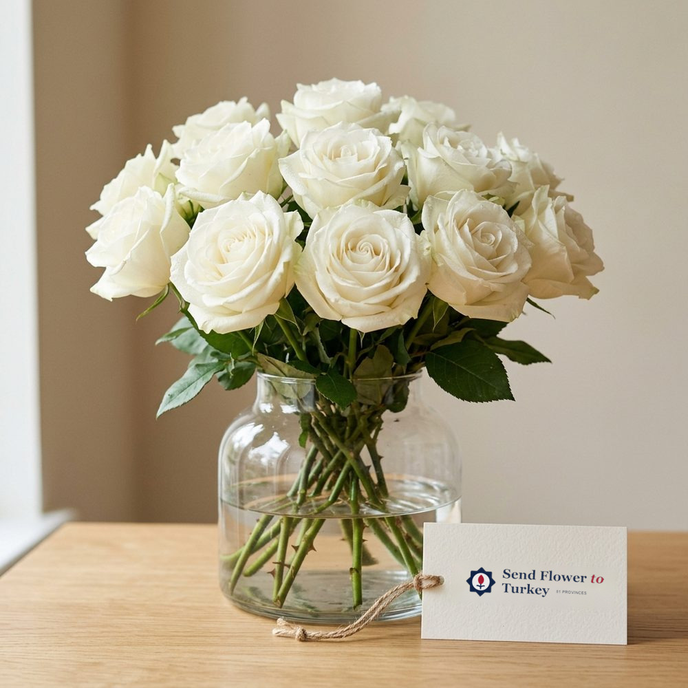 12 White Roses in a Glass Vase